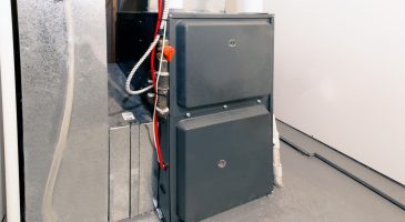A home high energy efficient furnace in a basement